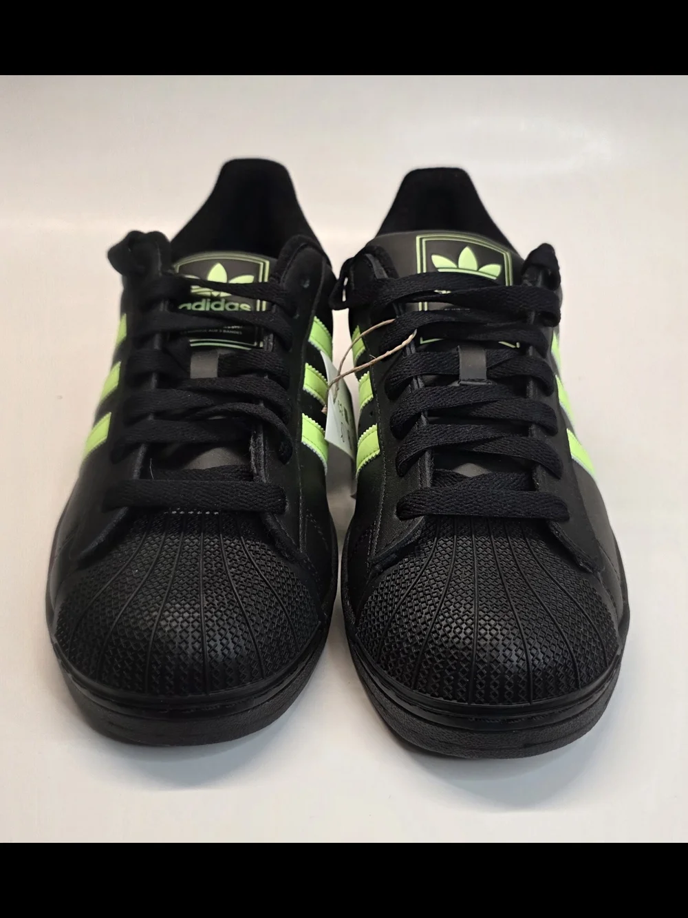 adidas Men’s Black Sneakers with Neon Green Stripes